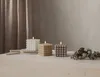 Three bubble candles of different colors are arranged on a wooden board and a table, with a curtain in the background. Podgląd zdjęcia produktu