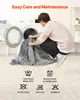 A person is putting a gray blanket into a washing machine, with care instructions shown below. Anteprima dell’immagine prodotto