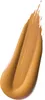 A swatch of liquid foundation on a white background. Náhled obrázku produktu