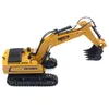 A yellow toy excavator is shown against a white background. Náhľad obrázku produktu
