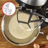 A close-up shot of a kitchen mixer with a bowl of batter, with a graphic overlay indicating silence. Produktbild-Vorschau