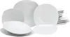 A collection of white ceramic plates and bowls arranged on a white background. Náhľad obrázku produktu
