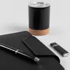 A desk set with a notebook, pen, USB drive, and a mug. Náhľad obrázku produktu
