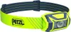 A Petzl TIKKA CORE headlamp with a yellow and blue headband is shown against a white background. Produktbild-Vorschau