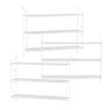 A set of modular white wall shelves against a white background. Voir les images du produit
