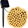 A solar-powered string of lights with a solar panel unit and a bundle of warm white LED lights. Náhled obrázku produktu
