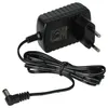 A black power adapter with a cord and plug. Produktbild-Vorschau