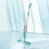 A spray mop is shown on a tiled floor in front of a window with a light blue tint. Anteprima dell’immagine prodotto