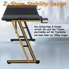 A gaming desk with a Z-shaped frame, highlighted with orange accents, and text describing its stability. Produktbild-Vorschau
