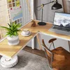A modern home office setup with a corner desk, laptop, coffee, and a robot vacuum cleaner. Produktbild-Vorschau