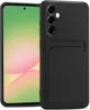 A black phone case with a card slot is shown on a white background, next to a smartphone. Podgląd zdjęcia produktu