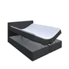 A bed with a mattress lifted to reveal storage space underneath. Produktbild-Vorschau