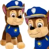 Two plush toys of the character Chase from Paw Patrol are shown against a white background. One toy is shown in full, while the other is a close-up of its head. Anteprima dell’immagine prodotto