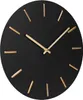 A close-up shot of a black wall clock with gold hour markers and hands. Voir les images du produit