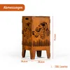 A metal fire pit with tractor and wheat designs, with dimensions indicated. Produktbild-Vorschau