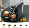 A coffee machine is shown on a table with a cup of coffee and various coffee pods. The bottom of the image displays different types of coffee compatibility. Produktbild-Vorschau