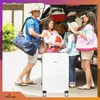 A family is packing luggage into the back of a car for a trip. Produktbild-Vorschau