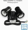 A black twin LED spotlight with a motion sensor, shown against a white background. Produktbild-Vorschau