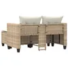 The back view of a beige poly rattan garden sofa with two white cushions. Produktbild-Vorschau