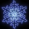 A lit snowflake decoration against a black background. Produktbild-Vorschau