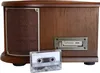 A vintage-style stereo system with a cassette tape in the foreground. Produktbild-Vorschau