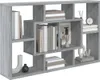 A gray wooden bookshelf filled with books and decorative items. Voir les images du produit