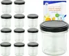 A set of glass jars with black lids, along with a recipe booklet. Náhled obrázku produktu