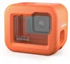 A close-up studio shot of an orange GoPro Floaty Hero accessory. Anteprima dell’immagine prodotto