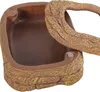 A close-up shot of a reptile food and water dish with a textured, rock-like exterior and a smooth interior. Produktbild-Vorschau