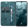 A teal flip case for a smartphone is open, showing credit cards and a banknote inserted, with the smartphone screen displaying the time and date. Produktbild-Vorschau