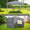 A collage showing two different views of a gray pop-up gazebo in outdoor settings. The top image shows the gazebo set up in a garden with a table and chair, while the bottom image shows a closer view of the gazebo with windows. Voir les images du produit