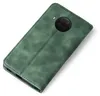 A green flip case for a smartphone is shown on a white background. Produktbild-Vorschau