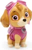 A figurine of the character Skye from Paw Patrol, wearing her pilot outfit. Voir les images du produit