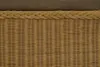 A close-up view of a woven rattan basket with a braided trim and a fabric top. Produktbild-Vorschau