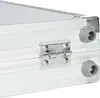 A close-up view of the corner of a silver aluminum case, showing a metal hinge and two gray rubber feet. Náhled obrázku produktu