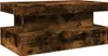 A wooden coffee table with a rustic, weathered finish. Voir les images du produit