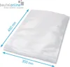 A clear plastic vacuum bag is shown laid flat on a white background, with dimensions indicated by blue arrows and text. Produktbild-Vorschau
