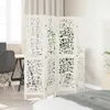 A white room divider is shown in a bedroom setting, partially obscuring a desk and chair. Voir les images du produit