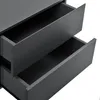 A close-up view of two open drawers of a dark gray nightstand. Anteprima dell’immagine prodotto