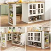 A collage of images showing a white and wood kitchen island with glass cabinet doors and open shelving, displaying various kitchen items and food products. Produktbild-Vorschau