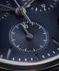 A close-up view of a dark blue watch face with silver hands and markings. Podgląd zdjęcia produktu