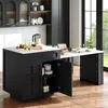 A modern kitchen with a black kitchen island and an extendable table. Anteprima dell’immagine prodotto