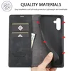 A hand is holding a black phone case, showing its interior card slots and the phone holder. Produktbild-Vorschau
