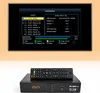 A satellite receiver and its remote control are shown in front of a television screen displaying the installation menu. Produktbild-Vorschau