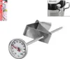 A stainless steel kitchen thermometer with a clip, shown against a white background. A small inset image shows the thermometer attached to a pot. Voir les images du produit