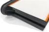 A close-up, angled view of a white pleated filter with black and orange trim, set against a white background. Produktbild-Vorschau