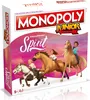 The image shows the front of a Monopoly Junior board game box featuring characters and horses from the DreamWorks Spirit Riding Free series. Produktbild-Vorschau