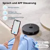A person is holding a smartphone displaying a cleaning app, with a robot vacuum cleaner in the background. Produktbild-Vorschau