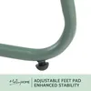 Close-up of the base of a green table with an adjustable foot pad. Produktbild-Vorschau