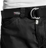 Close-up of a person wearing black pants and a black belt. Produktbild-Vorschau